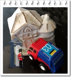 איור אילוסטרציה של דירה ורכב עם חייל של המלכה הבריטית