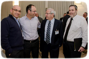 תמונה של ארבעה מבין משתתפי הפאנל